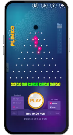 Multiple pink balls bouncing through the peg grid on Low risk mode with green multiplier slots at the bottom